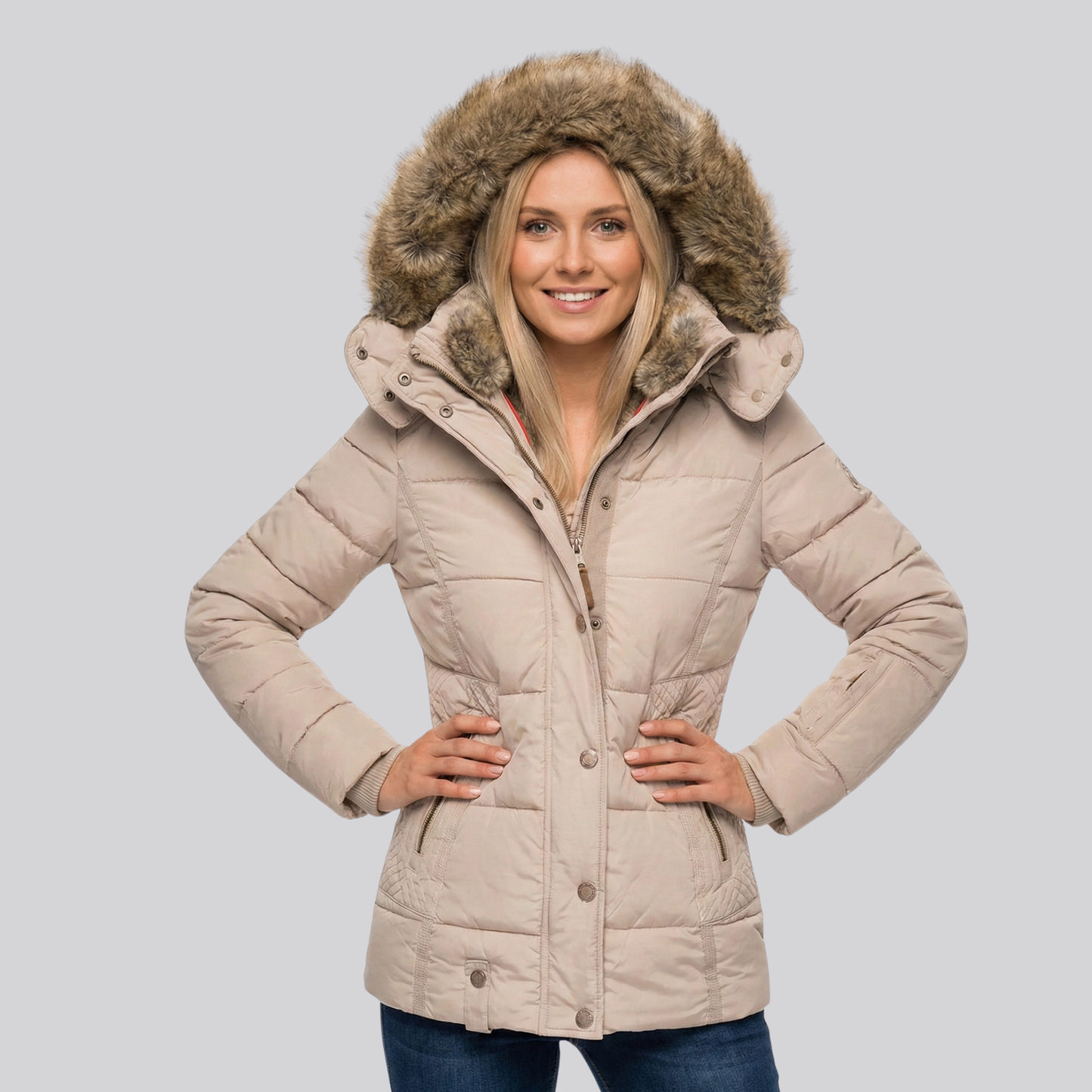 Damski pikowany płaszcz z futerkową podszewką