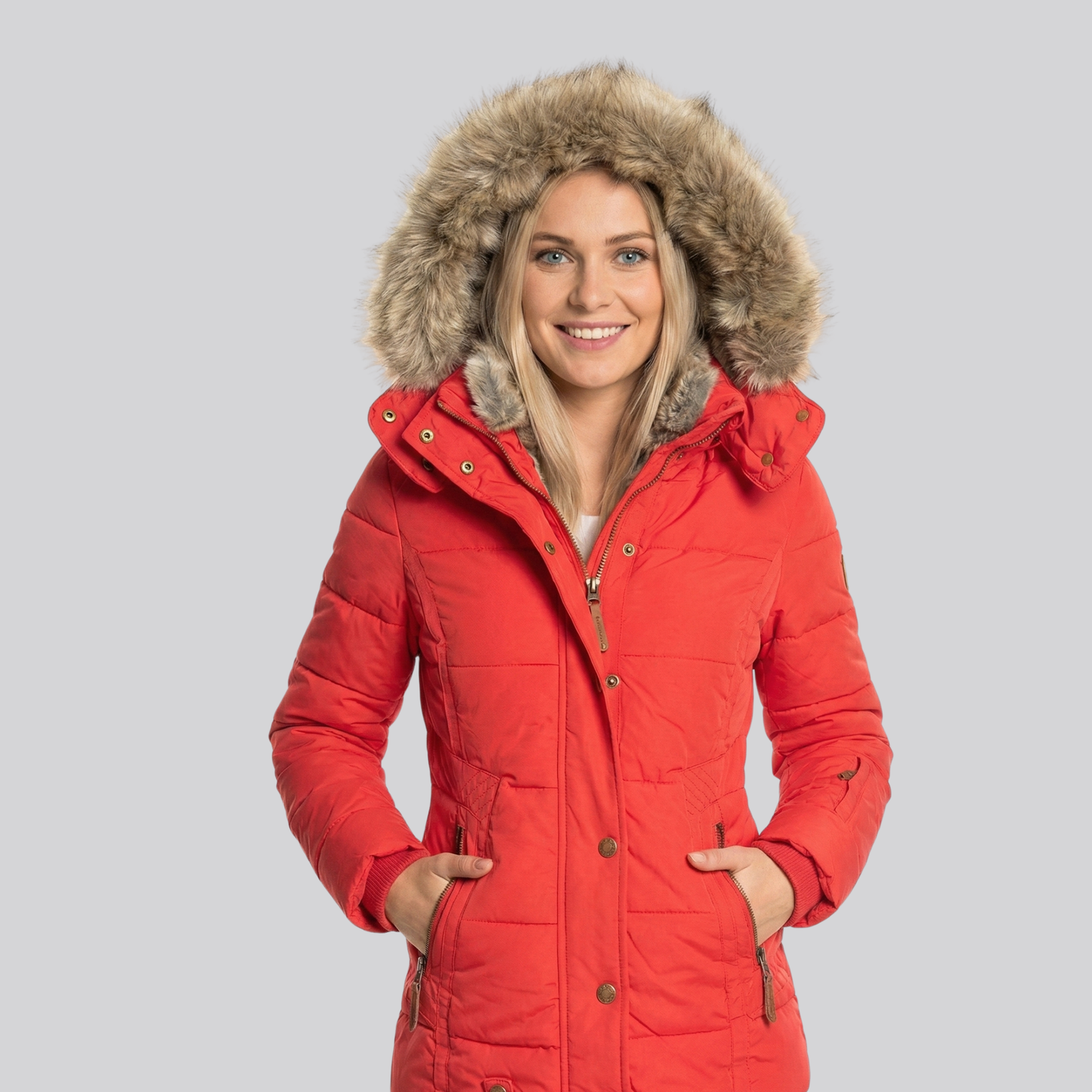 Damski pikowany płaszcz z futerkową podszewką